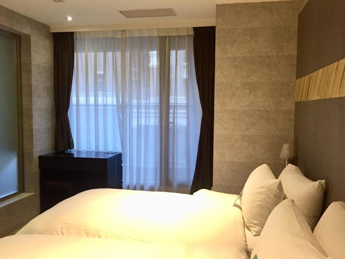 Fengjia Hotel Bell Тайджун Екстериор снимка