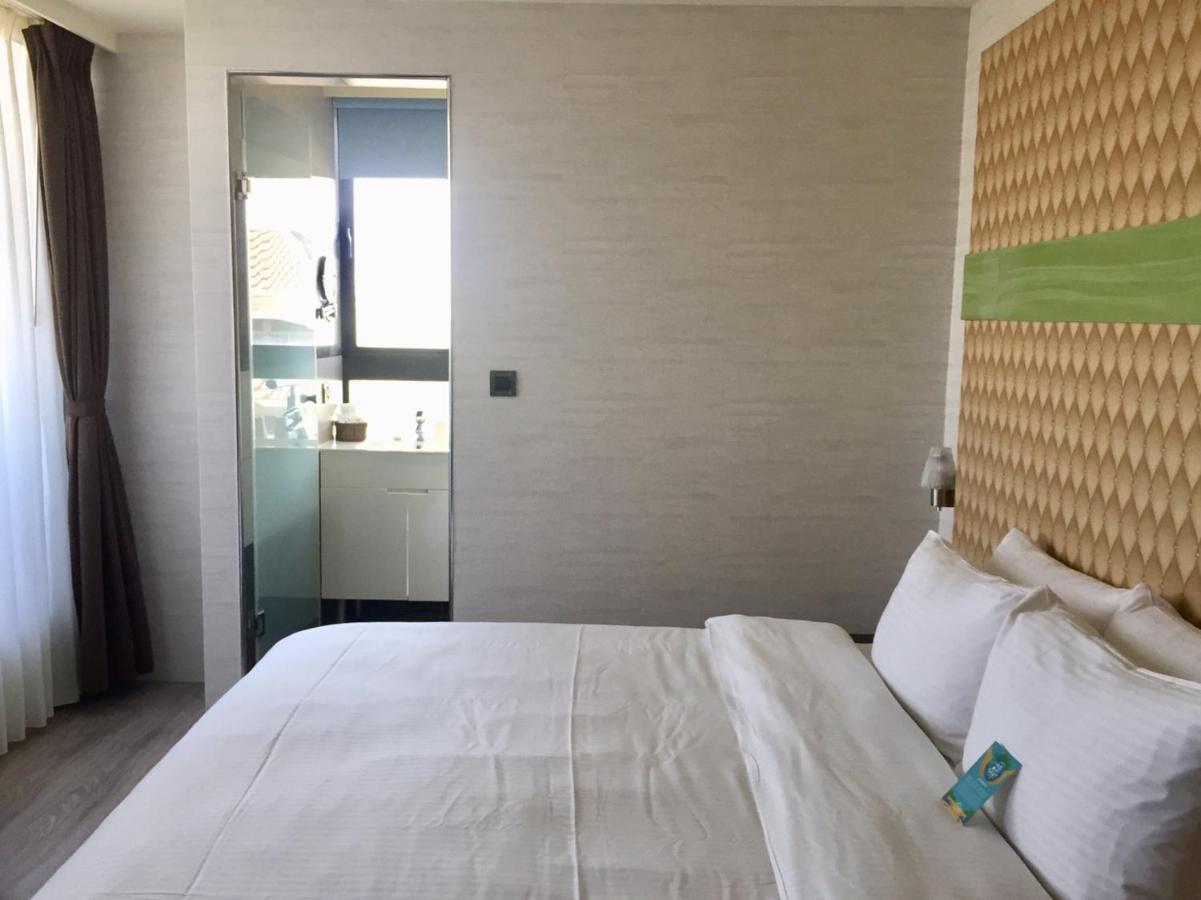 Fengjia Hotel Bell Тайджун Екстериор снимка